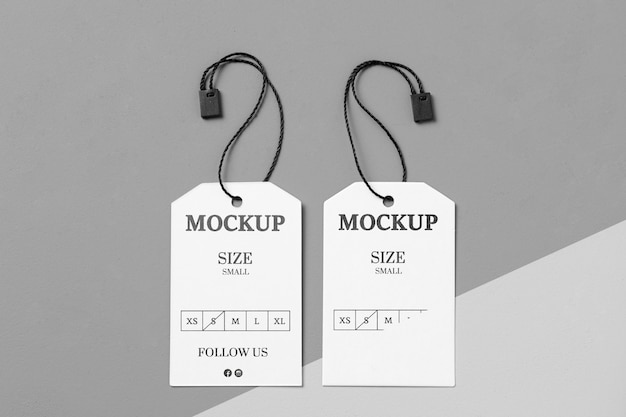 PSD clothing white size tags with black thread mock-up