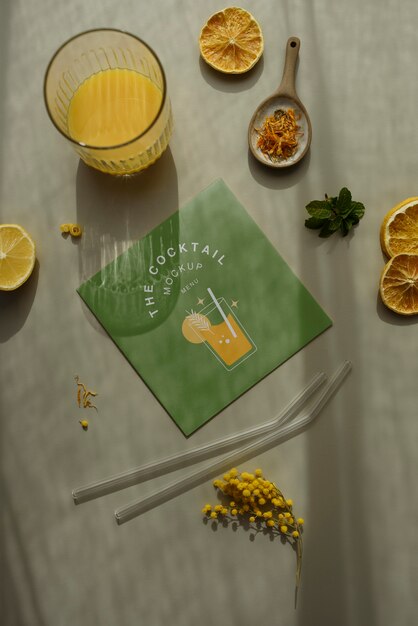 Cocktail flyer and lemons arrangement top view