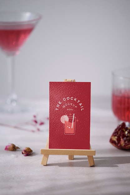 cocktail flyer and pomegranate arrangement