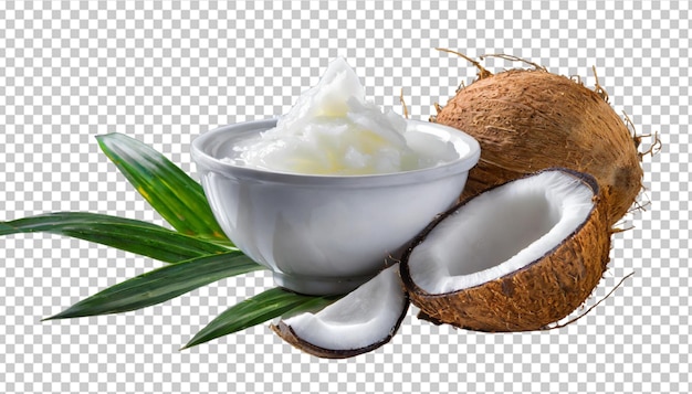 Coconut oil in a wooden spoon and coconut pieces isolated on white background