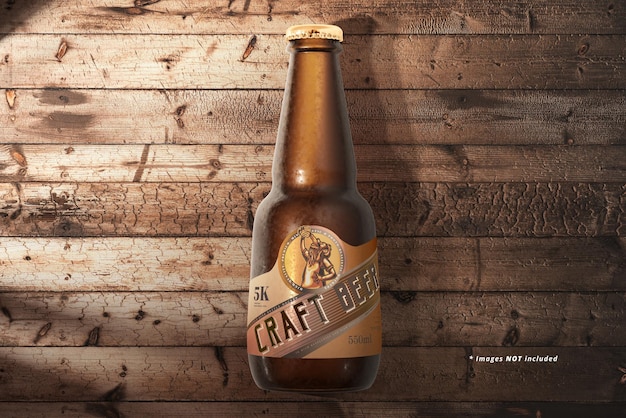 PSD cold beer bottle on wooden table mockup