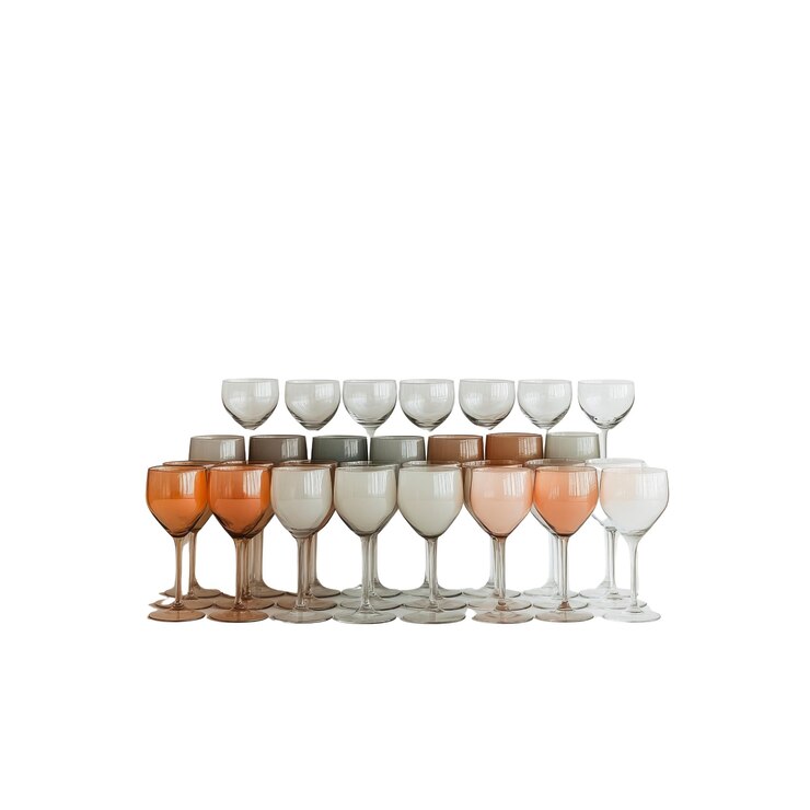 PSD collection of empty wine glasses in a gradient of beige and orange