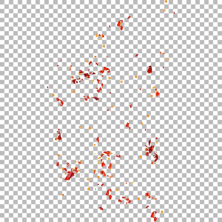 PSD a collection of red and orange chili flakes scattered on a white background