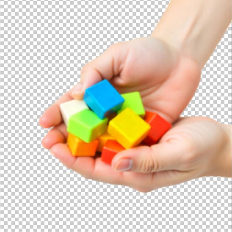 PSD color plastic blocks with hand isolated on the blank background
