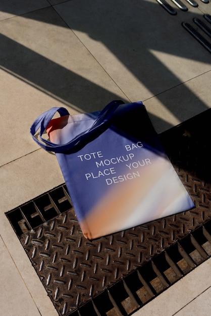 PSD colorful tote bag mock-up outdoors on golden hour