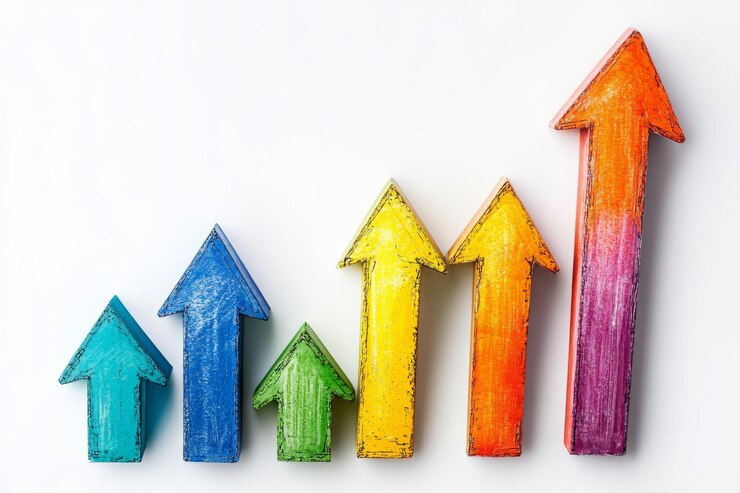 PSD colorful wooden arrows pointing upward representing growth and success on a white background