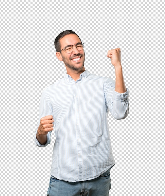 Competitive young man making a gesture of celebration