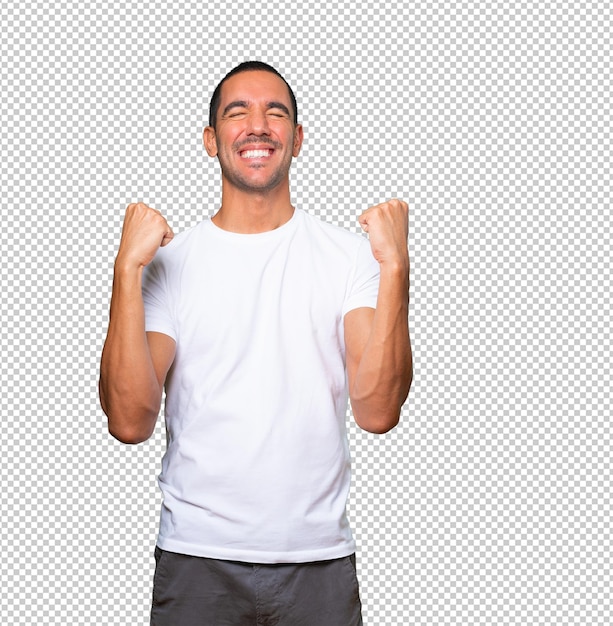 Competitive young man making a gesture of celebration