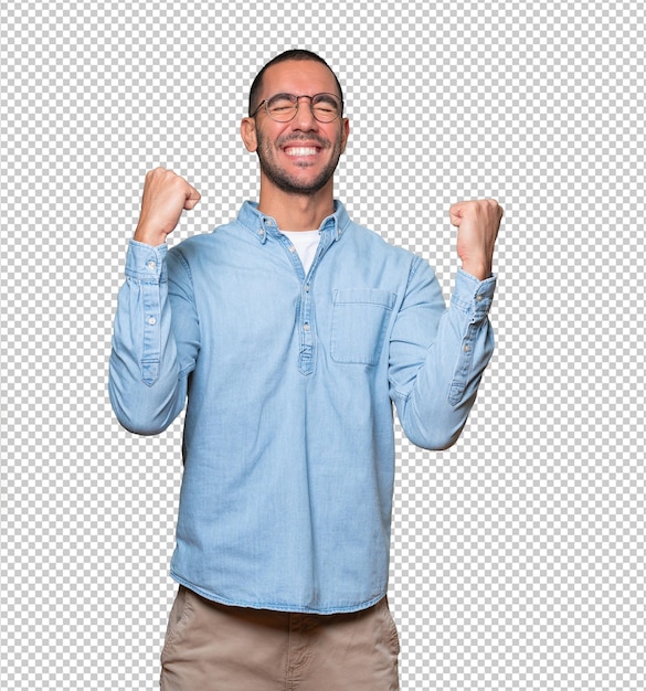 Competitive young man making a gesture of celebration