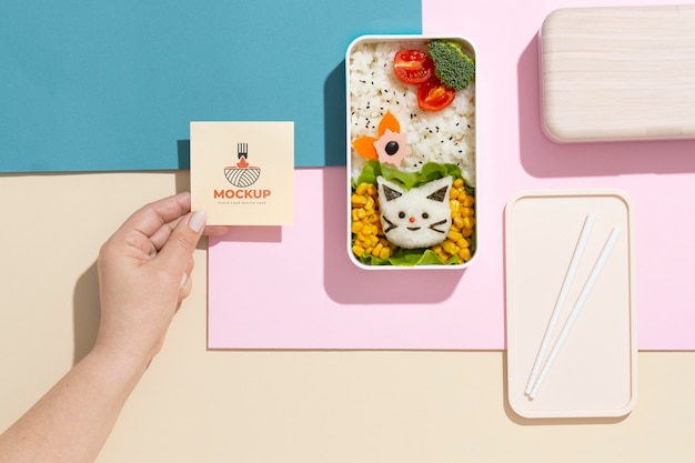 composition of bento box with mock-up card