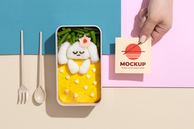 composition of bento box with mock-up card