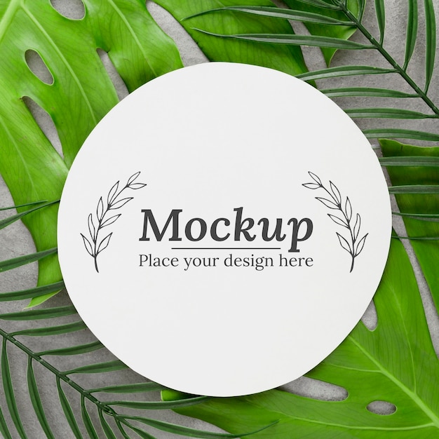 Composition of green leaves with mock-up