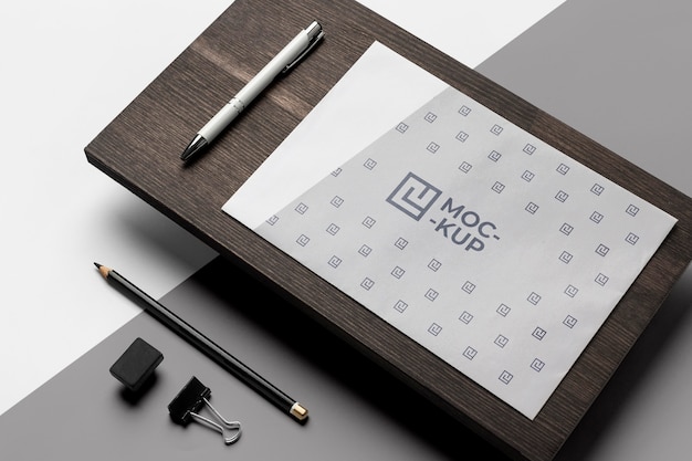 PSD composition of mock-up stationery on wood