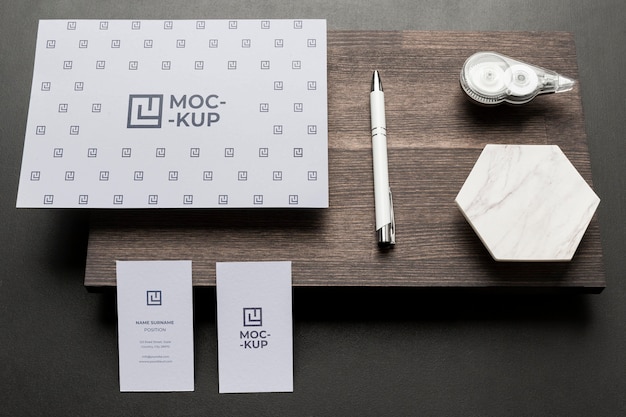 Composition of mock-up stationery on wood