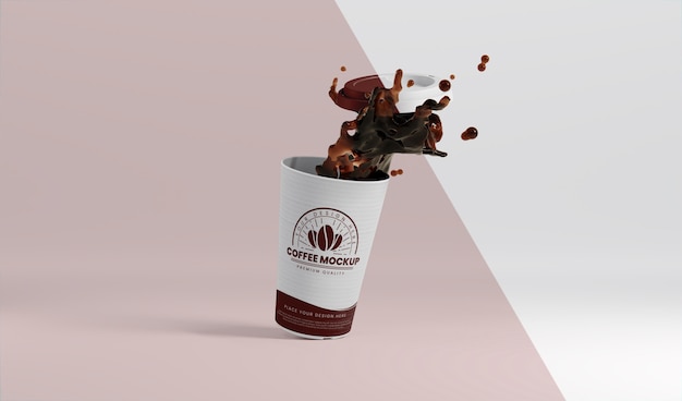 PSD composition of paper coffee cup with coffee splash