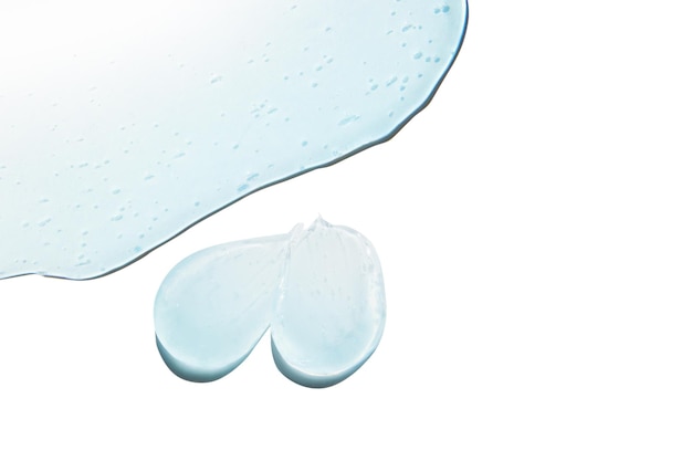 PSD composition of smears and drops or drops of a transparent blue gel serum on an empty transparent background