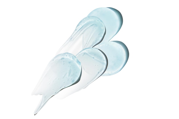 PSD composition of smears and drops or drops of a transparent blue gel serum on an empty transparent background