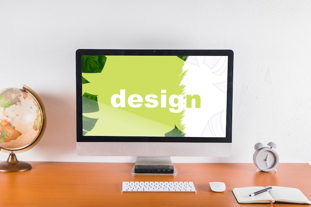 Computer mockup on desk with elements