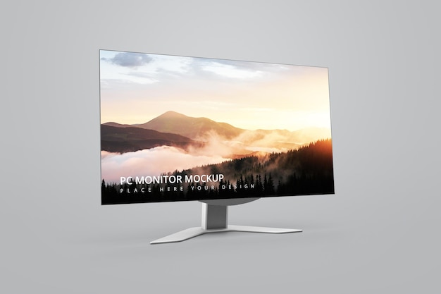 a computer monitor with a landscape on the screen