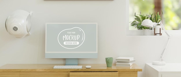 Computer monitor with mockup screen on wooden table in home office room 3D rendering  