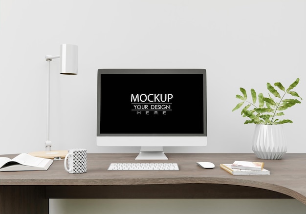 Computer op tafel in werkruimte psd mockup