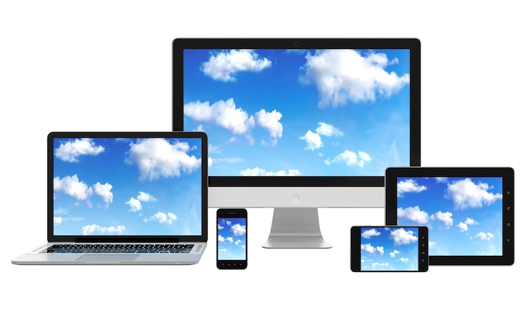 PSD a computer screen with a cloud on it and a laptop on it.