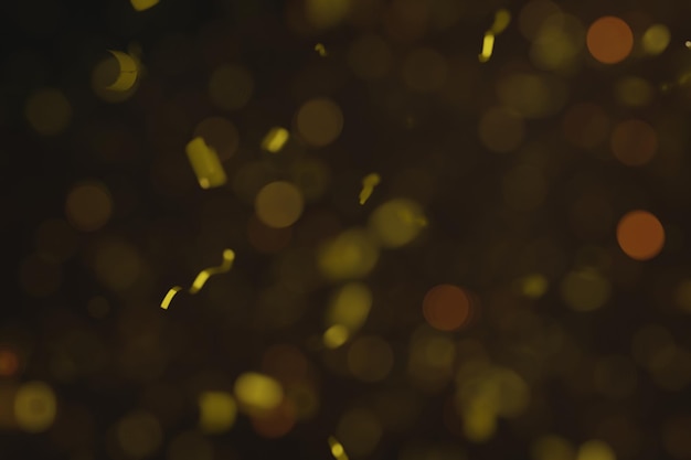Coriandoli con particelle sfocate per lo sfondo del nuovo anno