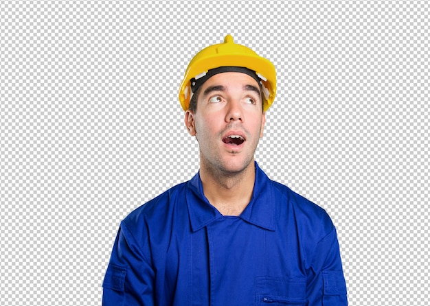 Confident worker looking up on white background