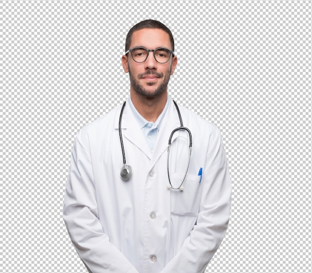 Confident young doctor posing