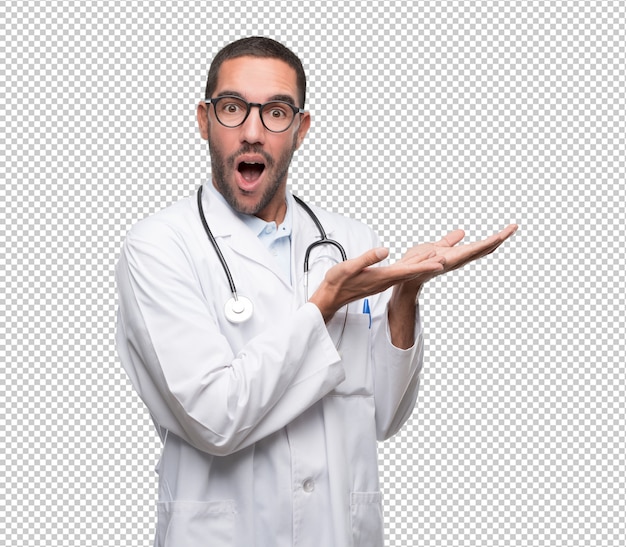 PSD confident young doctor showing something with his hands