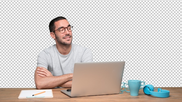 PSD confident young man sitting at his desk