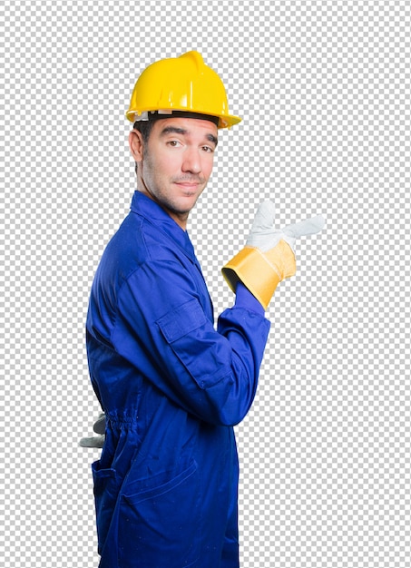 Cool workman pointing on white background