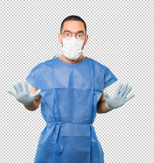 Coronavirus. Jonge man concepten doen en masker en beschermende handschoenen dragen