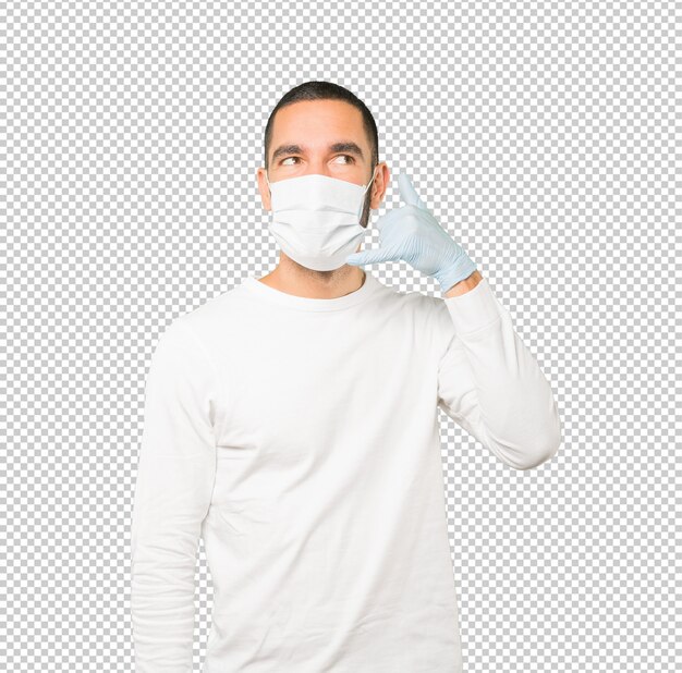Coronavirus.Young man doing concepts and wearing mask and protective gloves