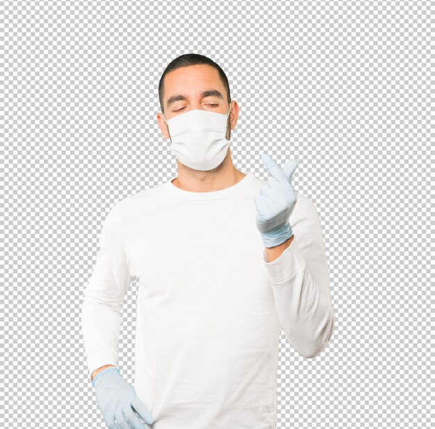 Coronavirus.young man doing concepts and wearing mask and protective gloves