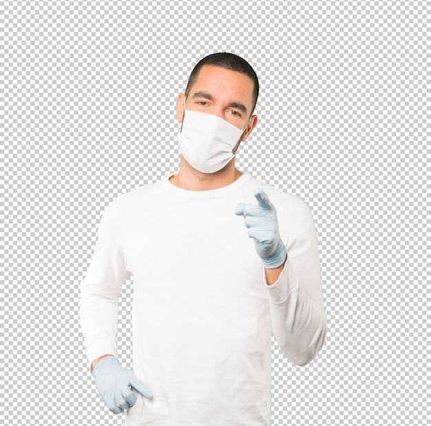 PSD coronavirus.young man doing concepts and wearing mask and protective gloves