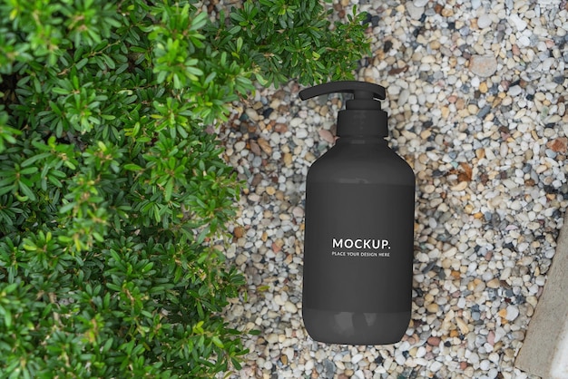 Cosmetic bottle mockup in nature eco background