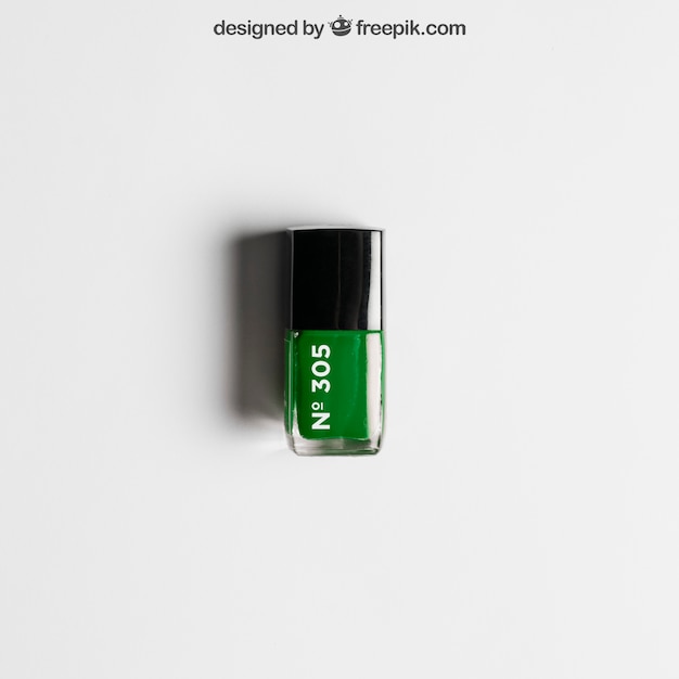 Cosmetic mockup with green nail polish