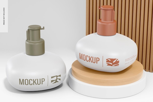 Cosmetic pump bottles with wooden background mockup, perspective