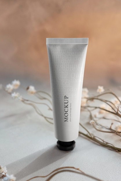 cosmetic tube bottle on grunge background