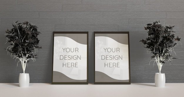 couple black frame mockup standing on the floor with couple black decorative plants