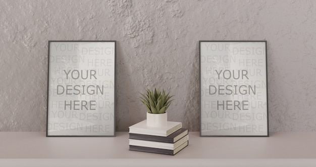 couple black frame mockup standing on white table with books and succulent. horizontal frame