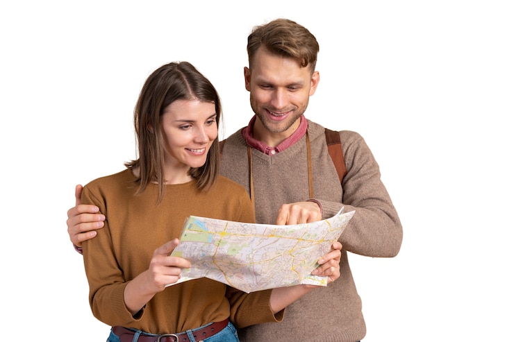 PSD couple consulting a map before traveling