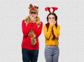 PSD couple dressed up for the christmas holidays covering mouth for saying something inappropr