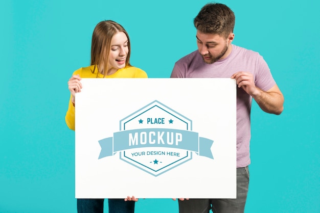 Couple holding a stationery mock-up card