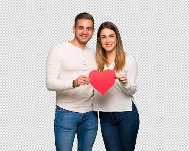 couple in valentine day holding a heart symbol