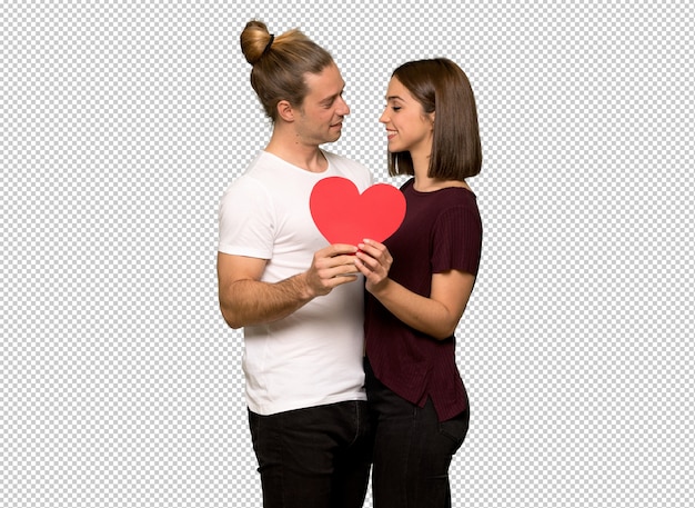 couple in valentine day holding a heart symbol