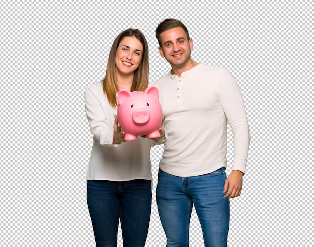 Couple in valentine day holding a piggybank