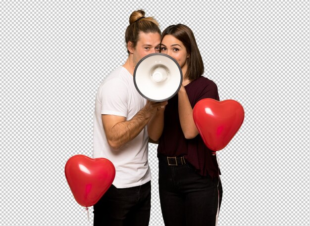 Couple in valentine day shouting through a megaphone