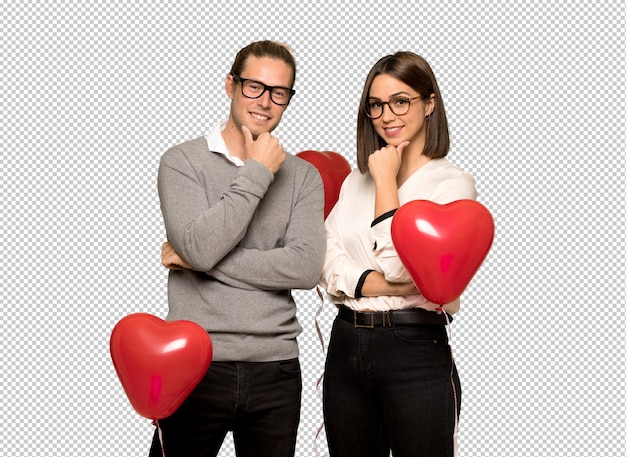 Couple in valentine day with glasses and smiling